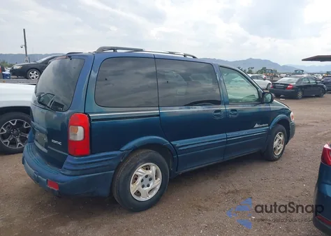 1999 Pontiac Montana z USA, uszkodzony, nr VIN 1GMDU03E5XD218351